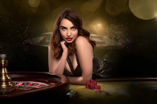 A glamorous woman holding casino chips in a neon-lit environment, representing the premium online casino atmosphere of JILI69.
