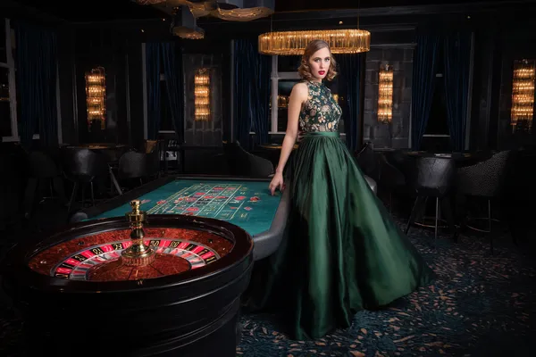 JILI69 Mobile Casino — Play anytime, anywhere A player using their smartphone during a festive local event, representing JILI69’s fully mobile-friendly casino.